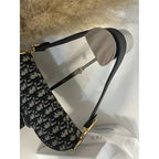 Christi*n Di*r  Oblique Saddle mini bag