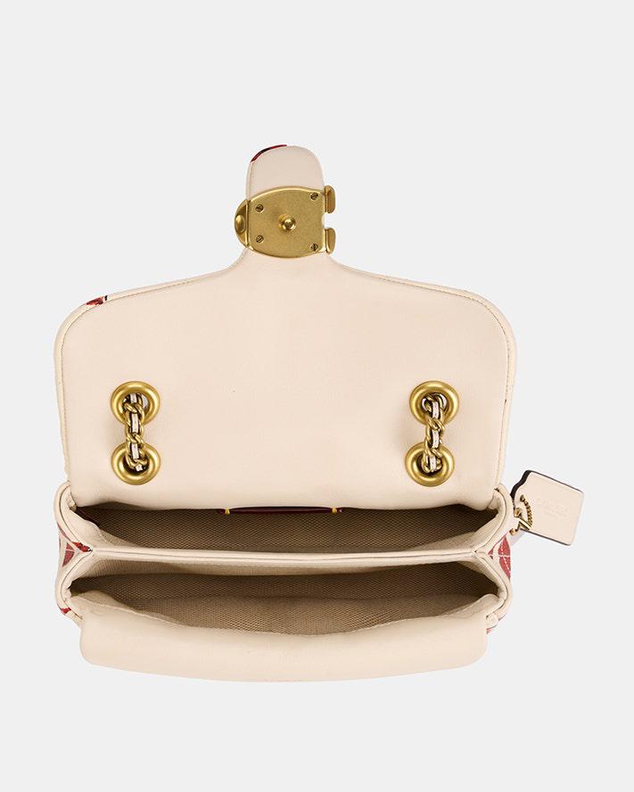 Co*ch Quilted Tabby Shoulder Bag 20 — Heart Print Edition