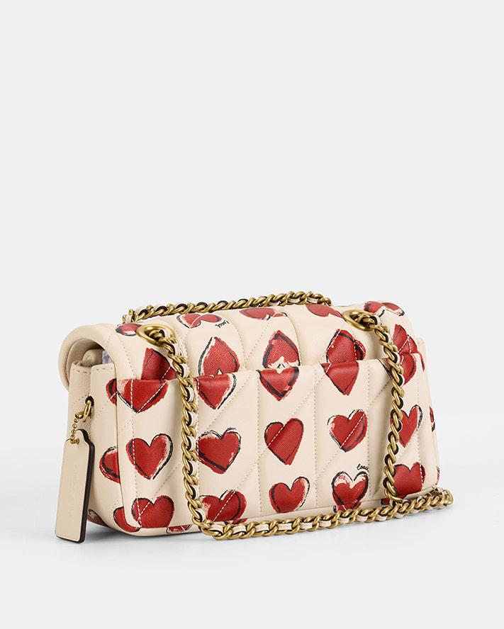 Co*ch Quilted Tabby Shoulder Bag 20 — Heart Print Edition